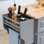 Isola da cucina grigio scuro con piano a ribalta e spazio contenitore