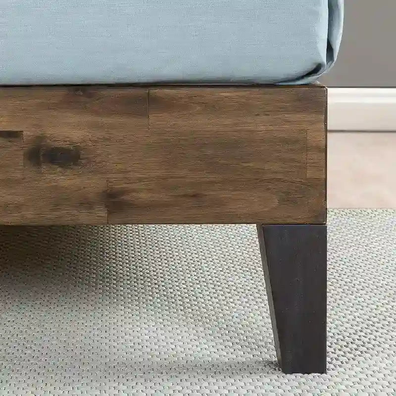 Struttura letto a piattaforma in legno marrone con testiera